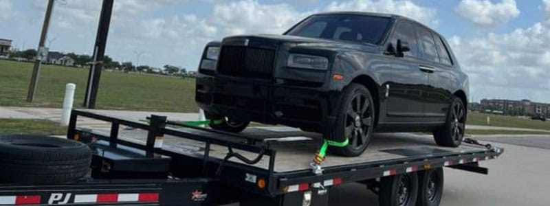 Black Vehicle on Car Trailer Rental in Michigan